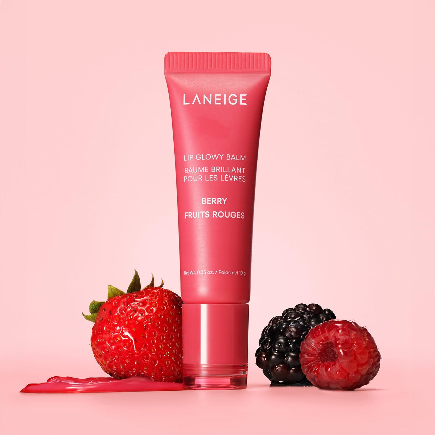 LANEIGE Lip Glowy Balm with shea butter provides sheer tint and hydration for soft, shiny lips.