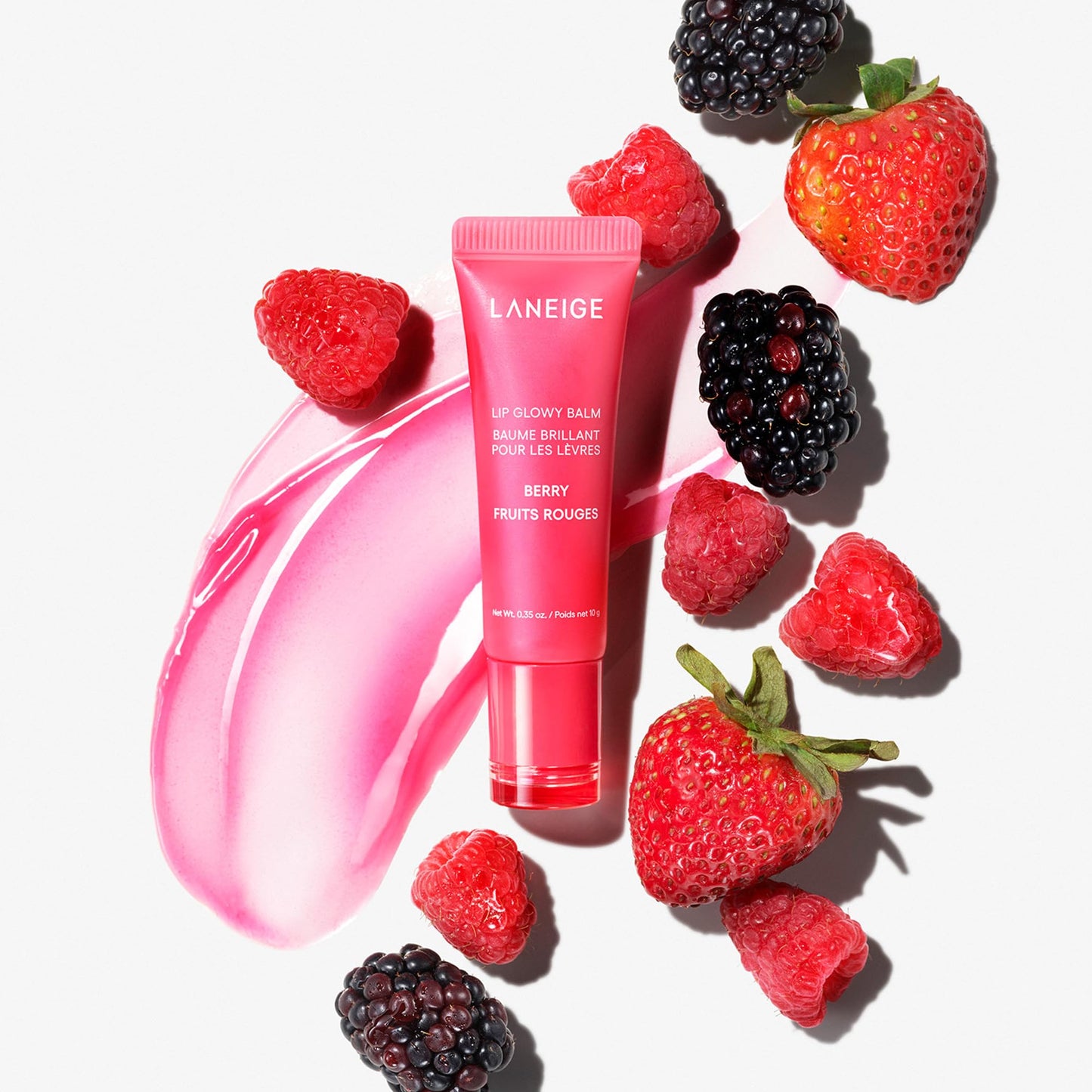 LANEIGE Lip Glowy Balm with shea butter provides sheer tint and hydration for soft, shiny lips.